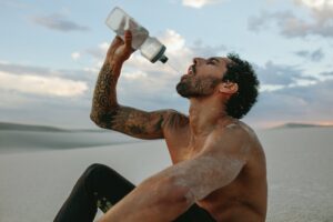 Athlete getting hydrated before a Martial Arts Competition