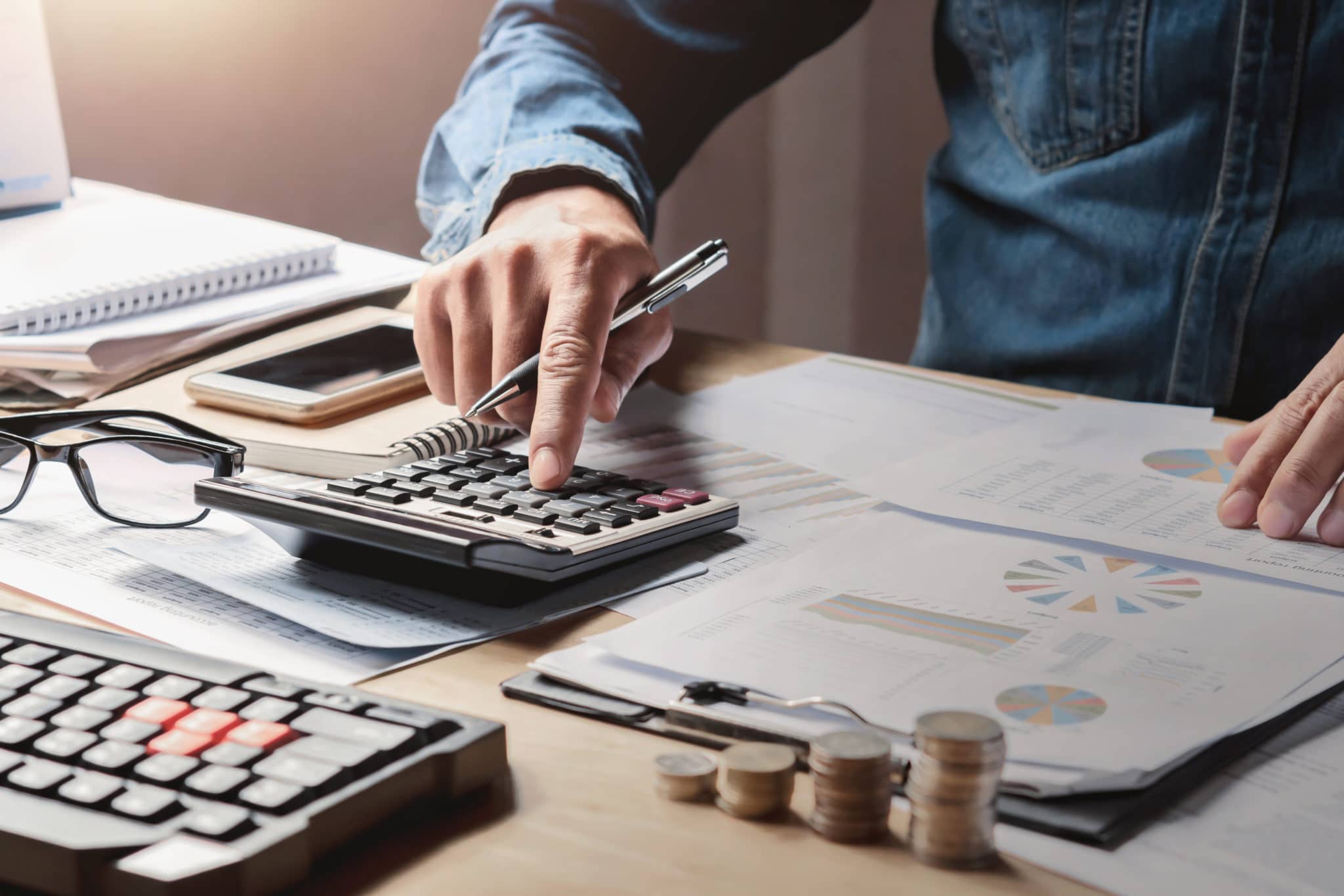 man using calculator