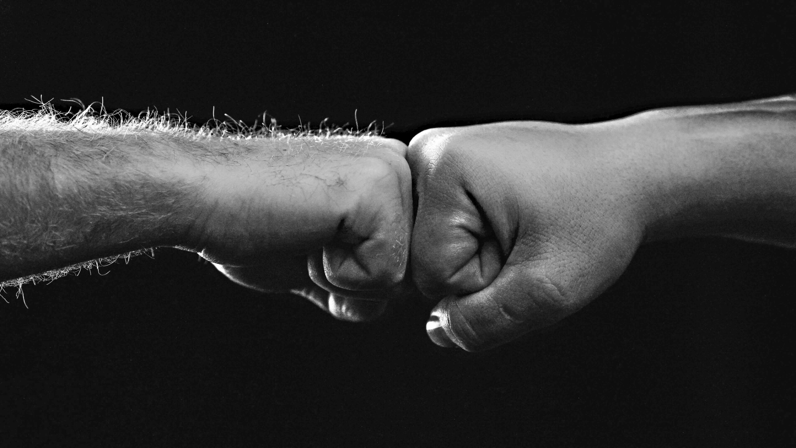 Fist-Bump-BW-1-1-scaled.jpg