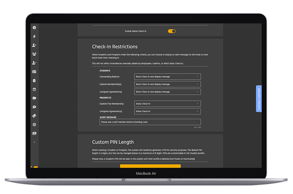 Laptop showing the Check-In Restrictions settings screen within Kicksite martial arts attendance software